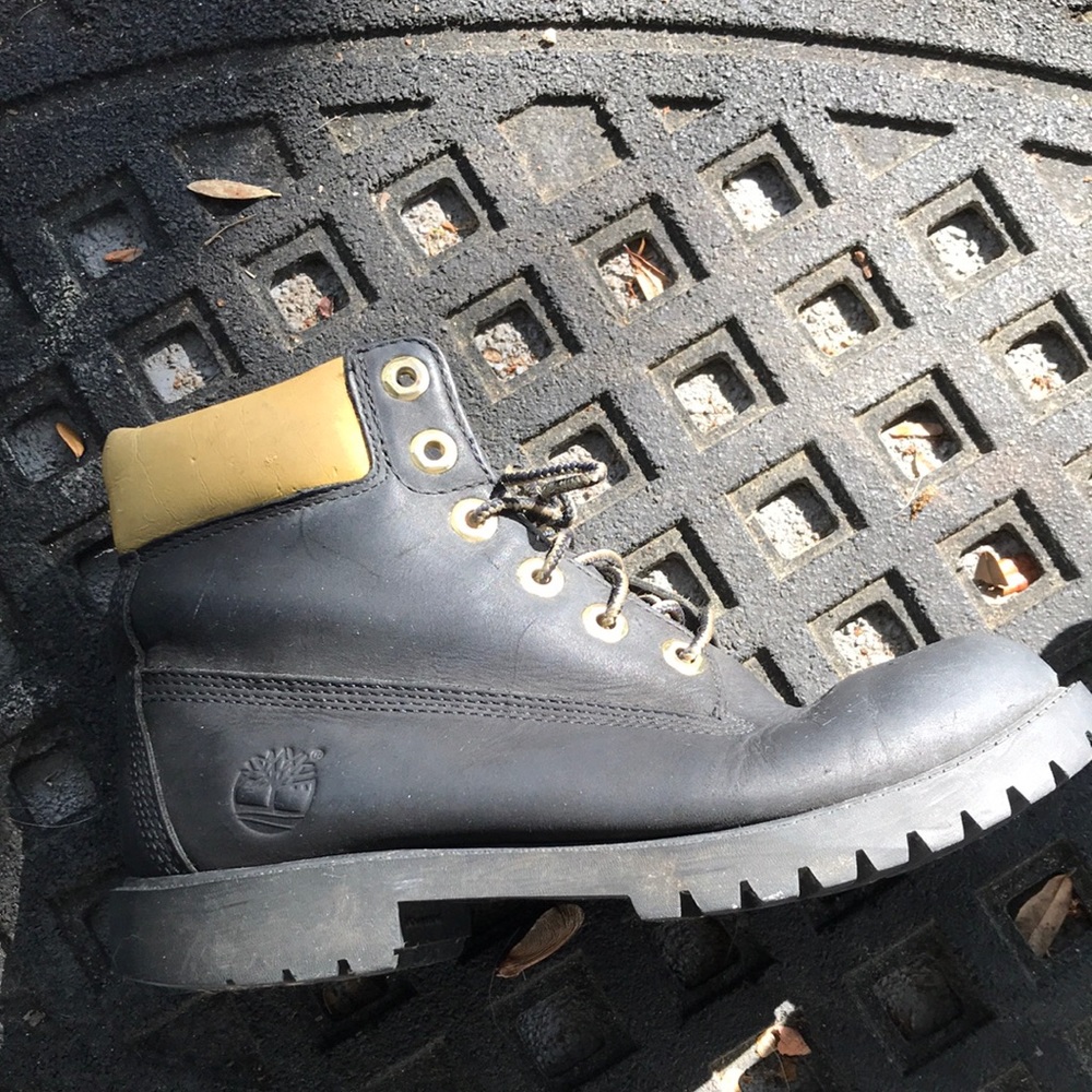 dirty Timberlands, rip inside the shoe, one side has laces and are very creased.